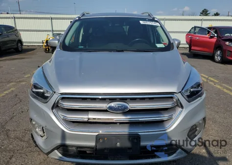 2017 Ford Escape Titanium z USA, uszkodzony, nr VIN 1FMCU9J98HUA58277